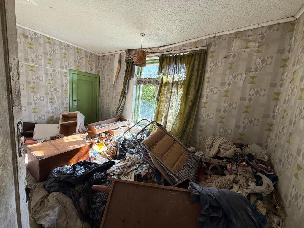 Lot: 170 - HOUSE FOR COMPLETE REFURBISHMENT - Back bedroom with possessions